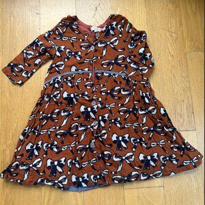 Pink Chicken Burnt Orange Dress with Navy Bow Detail